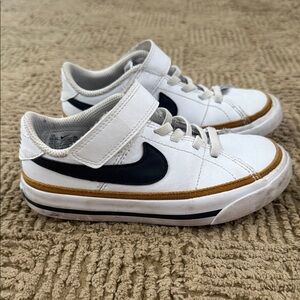 Nike Kids White and Black Sneakers with Gold Accents